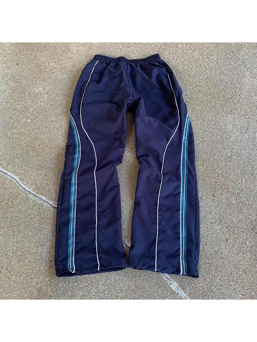 lightweight striped blue and white windbreaker pants. Wide leg opening. Size - Picture 5 of 8